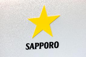Sapporo Breweries sign and logo